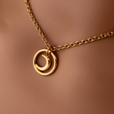 Gold O Ring and Moon