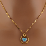 Submissive Day Collar – Gold BDSM O-Ring Necklace with Milky Blue Heart