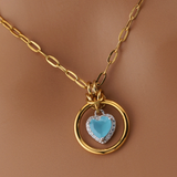 Submissive Day Collar – Gold BDSM O-Ring Necklace with Milky Blue Heart