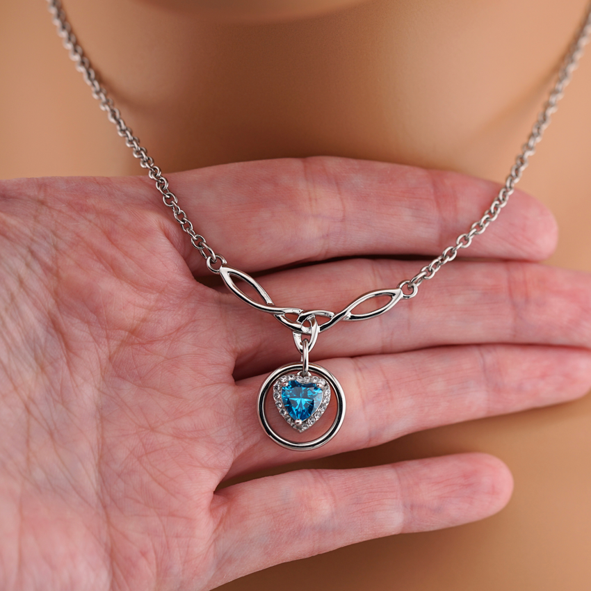 Celtic O Ring Collar with Blue Topaz Heart